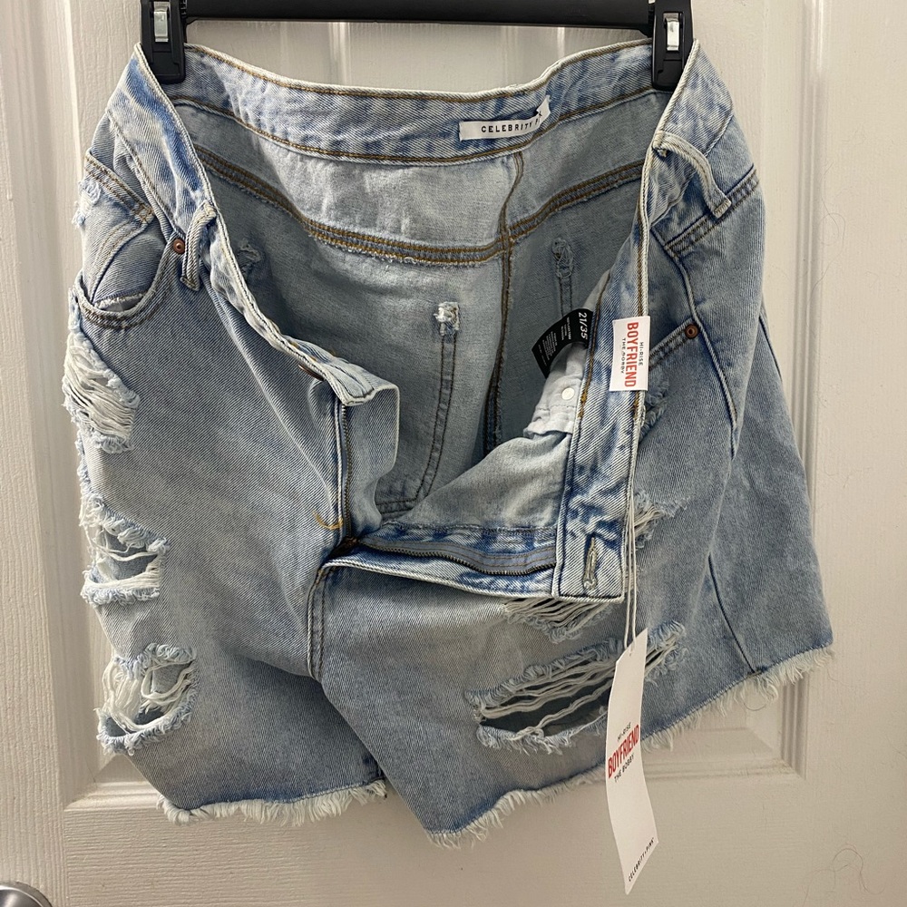 Boyfriend ripped shorts, never worn with tags